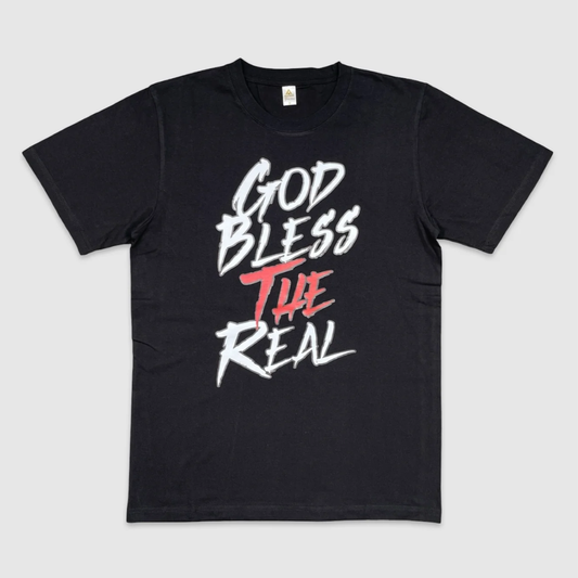 Black graphic t-shirt with bold text design 'God Bless The Real' in white and red print.