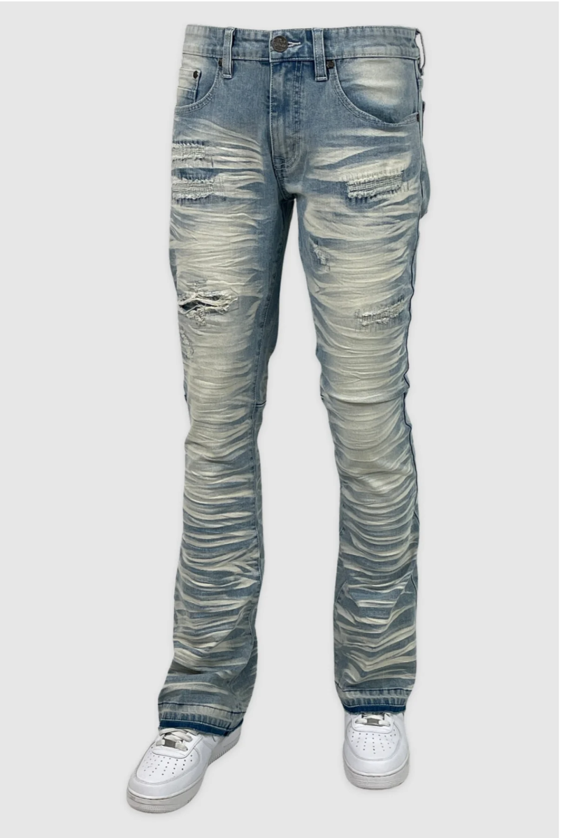 Medium Wash stacked jeans with ripped knee and ruched leg