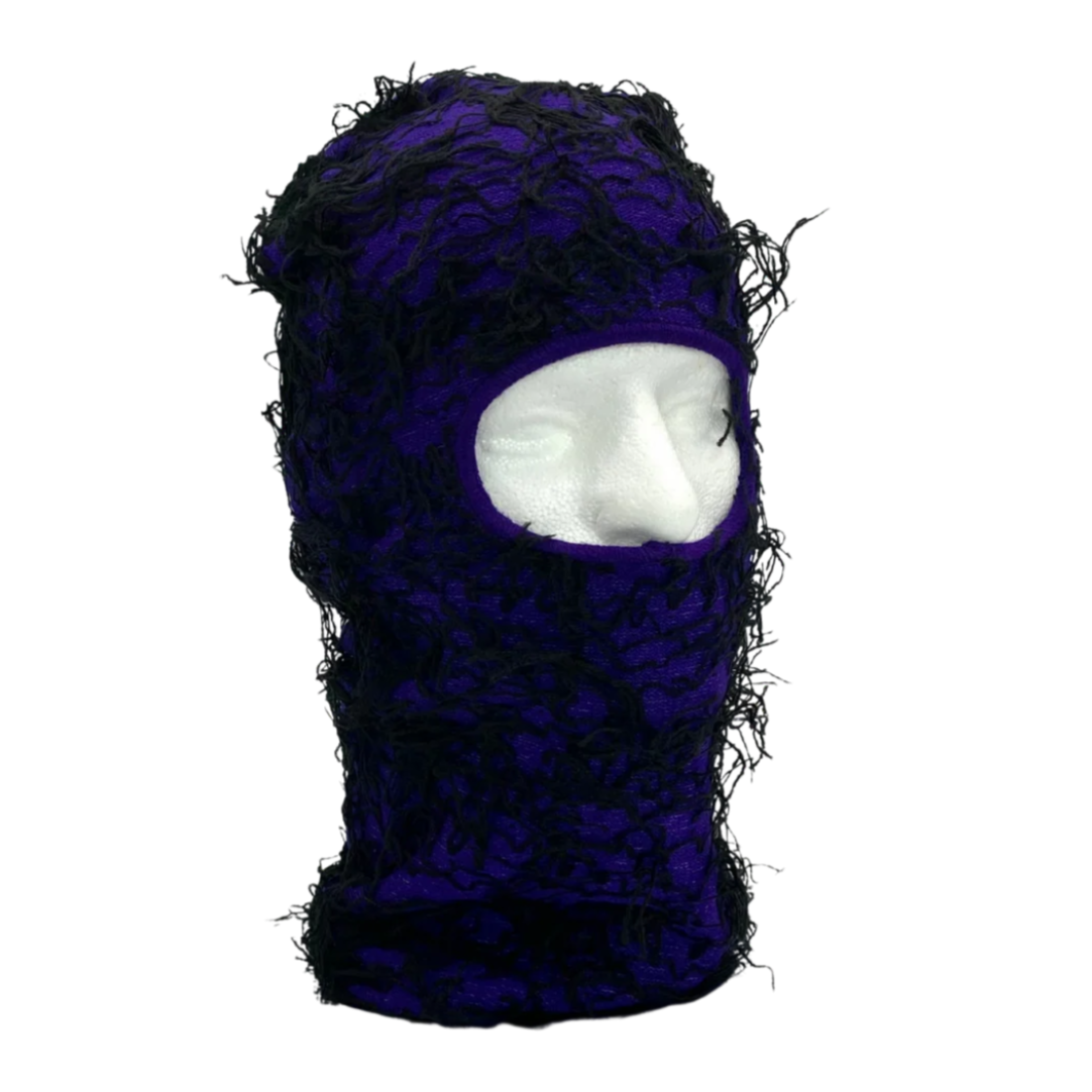 Purple knitted balaclava on a white background
