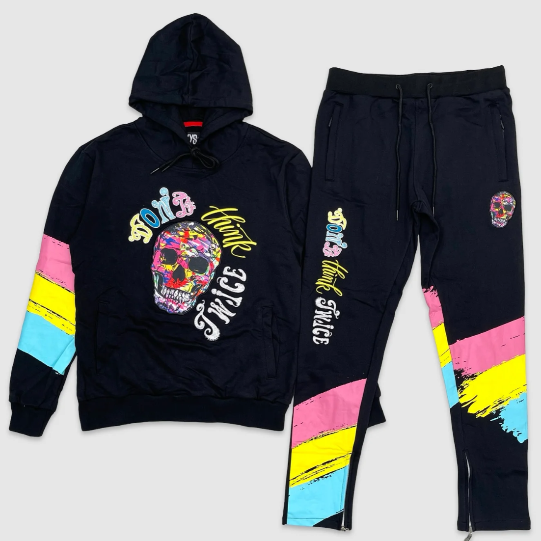 Blue hoodie and jogger set with colorful graffiti-style skull graphic, neon pink, yellow, and blue paint stripe accents, and bold text 'Don’t Think Twice' – urban streetwear tracksuit.