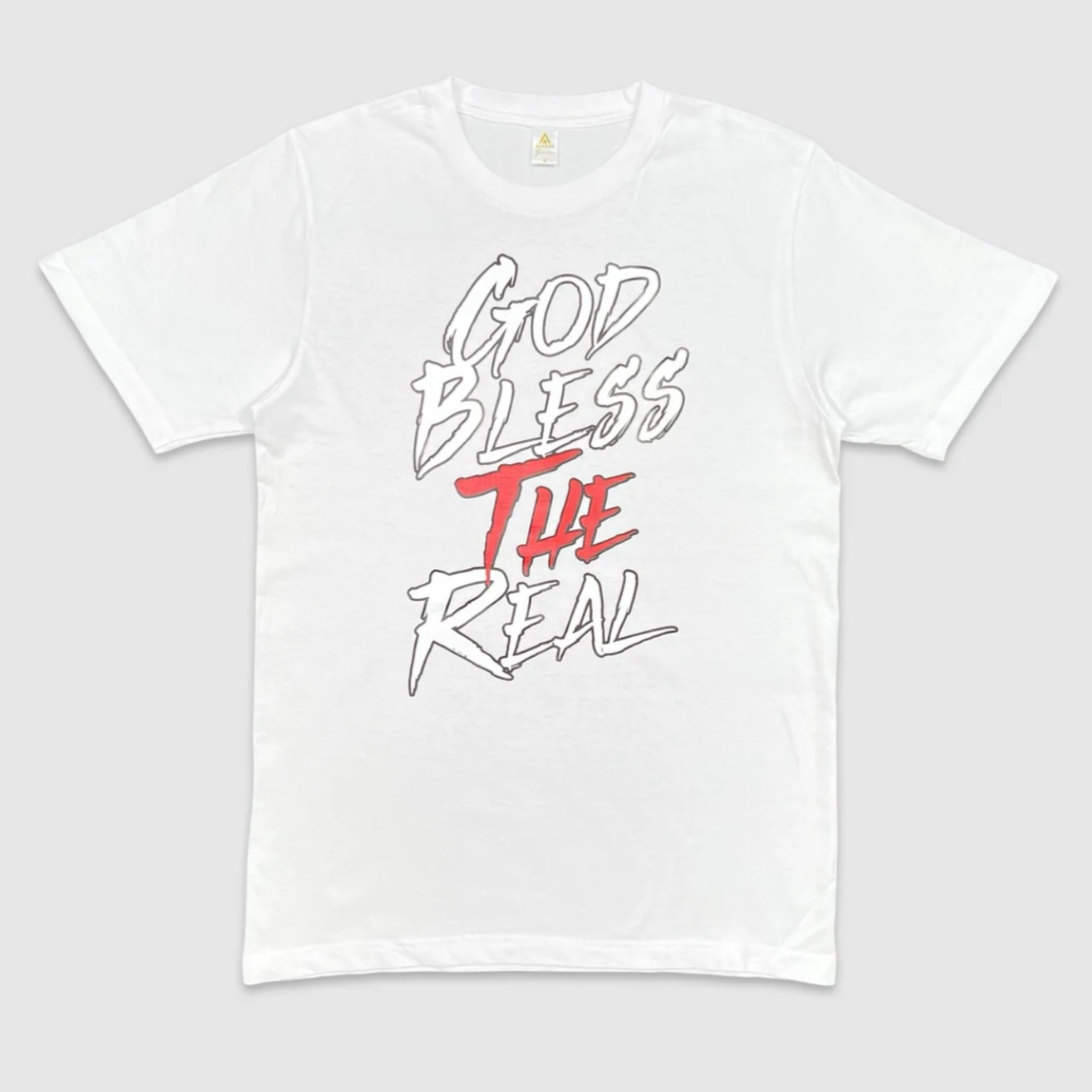 White graphic t-shirt with bold text design 'God Bless The Real' in white and red print.