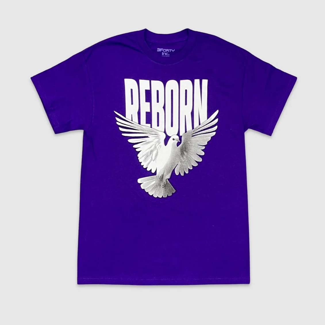 Purple Reborn Dove Graphic Tee with bold white lettering and dove print