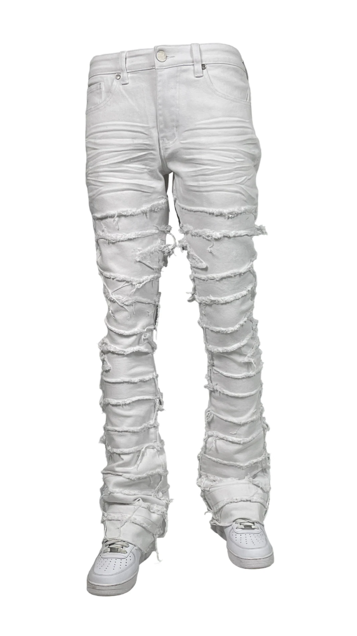Men’s distressed stacked jeans in white wash with heavy shredded detailing and layered denim texture